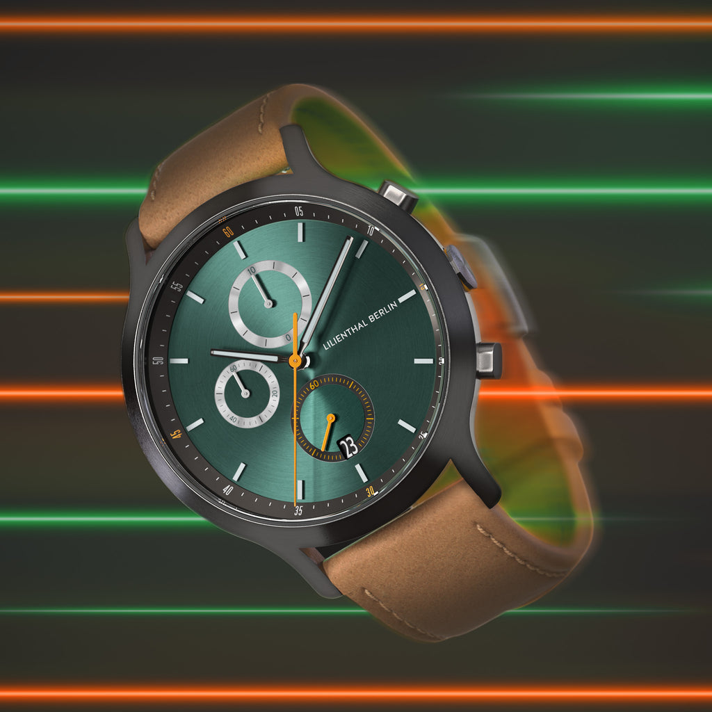 Modern green dial chronograph watch with brown leather strap, close-up on neon lines background