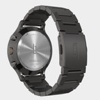 Stainless steel chronograph watch with black metal link bracelet, case back detailing, modern design