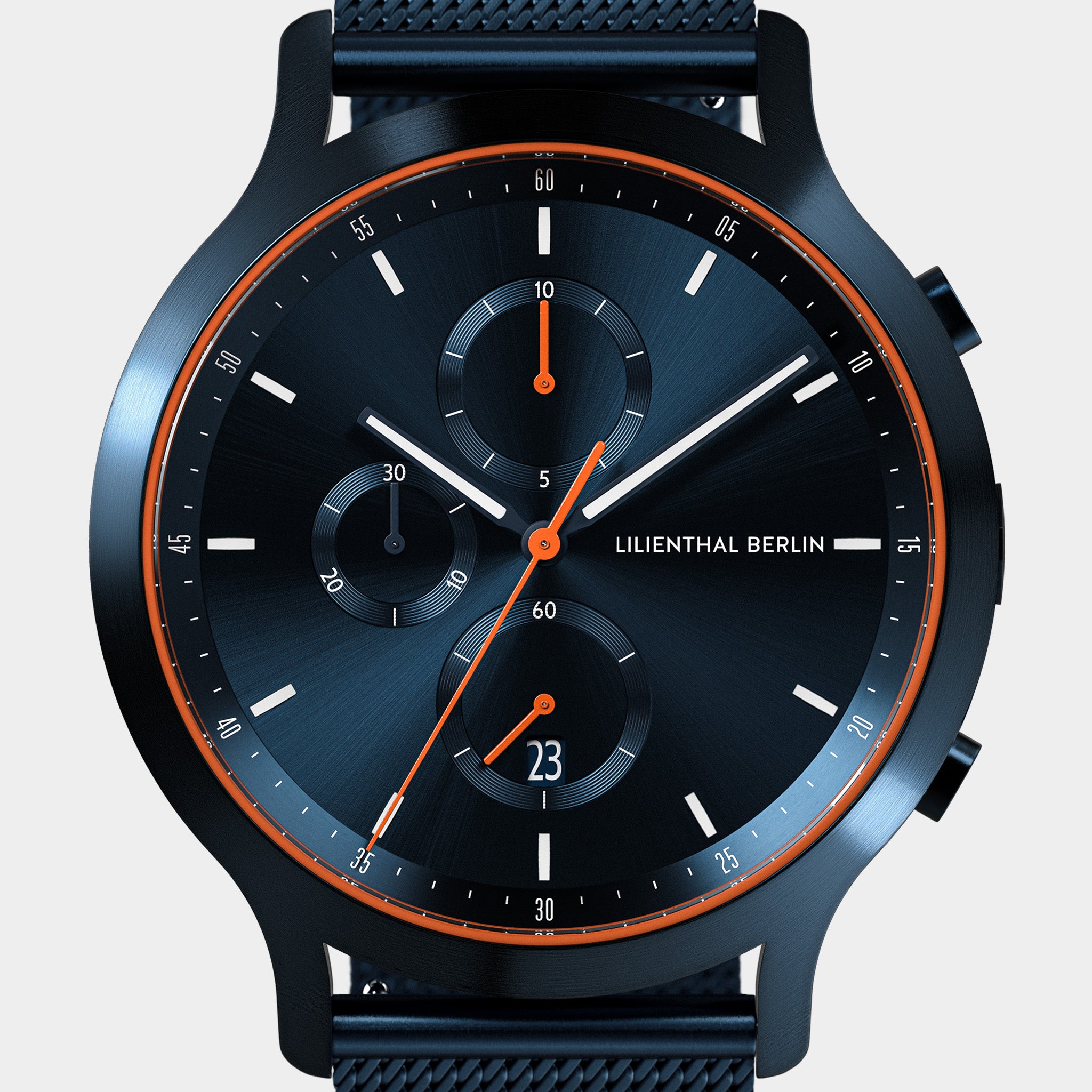 Modern black chronograph watch with orange accents and mesh band, subdials and date display