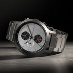 Stainless steel chronograph watch with silver dial, black subdials, and date display