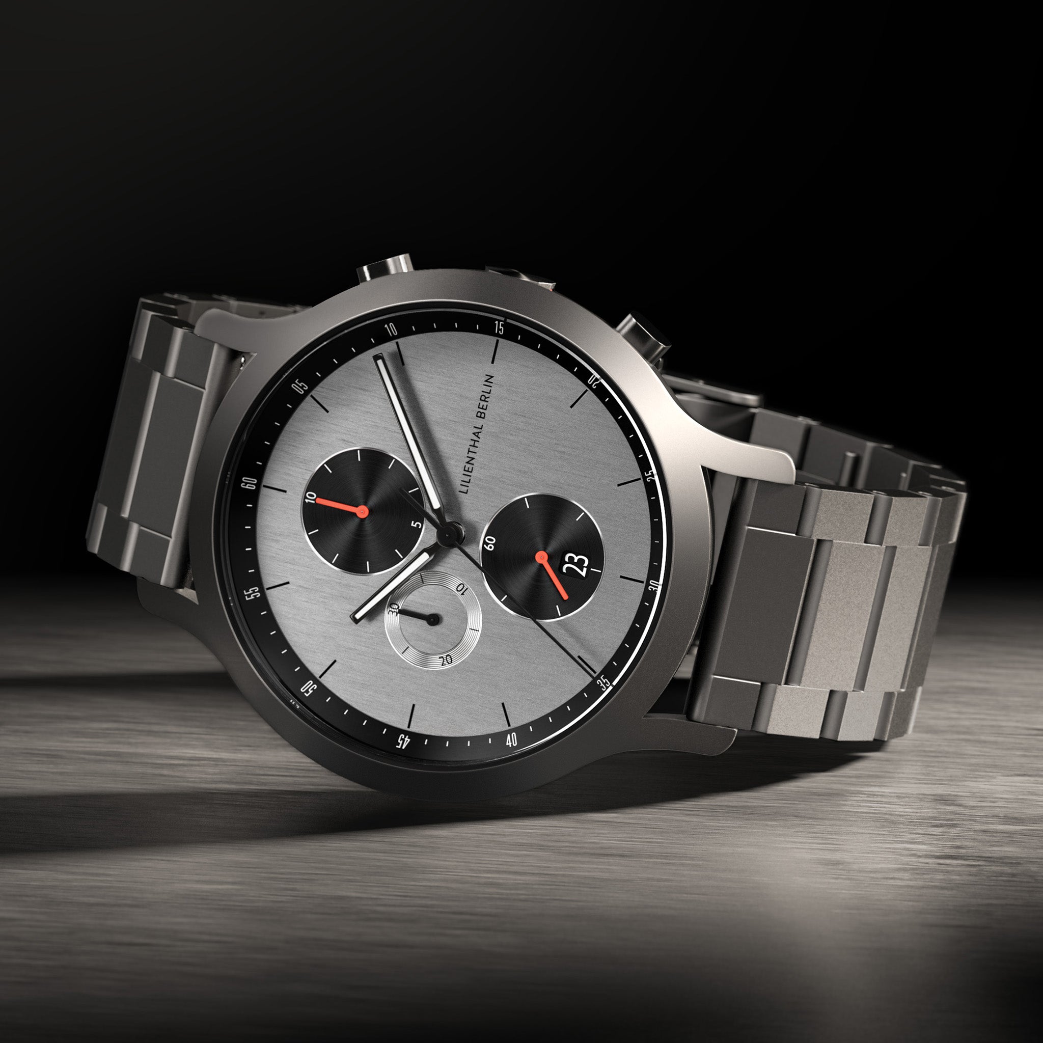 Stainless steel chronograph watch with silver dial, black subdials, and date display