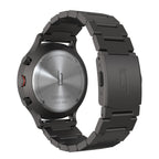 Stainless steel chronograph watch with black metal bracelet, viewed from the back