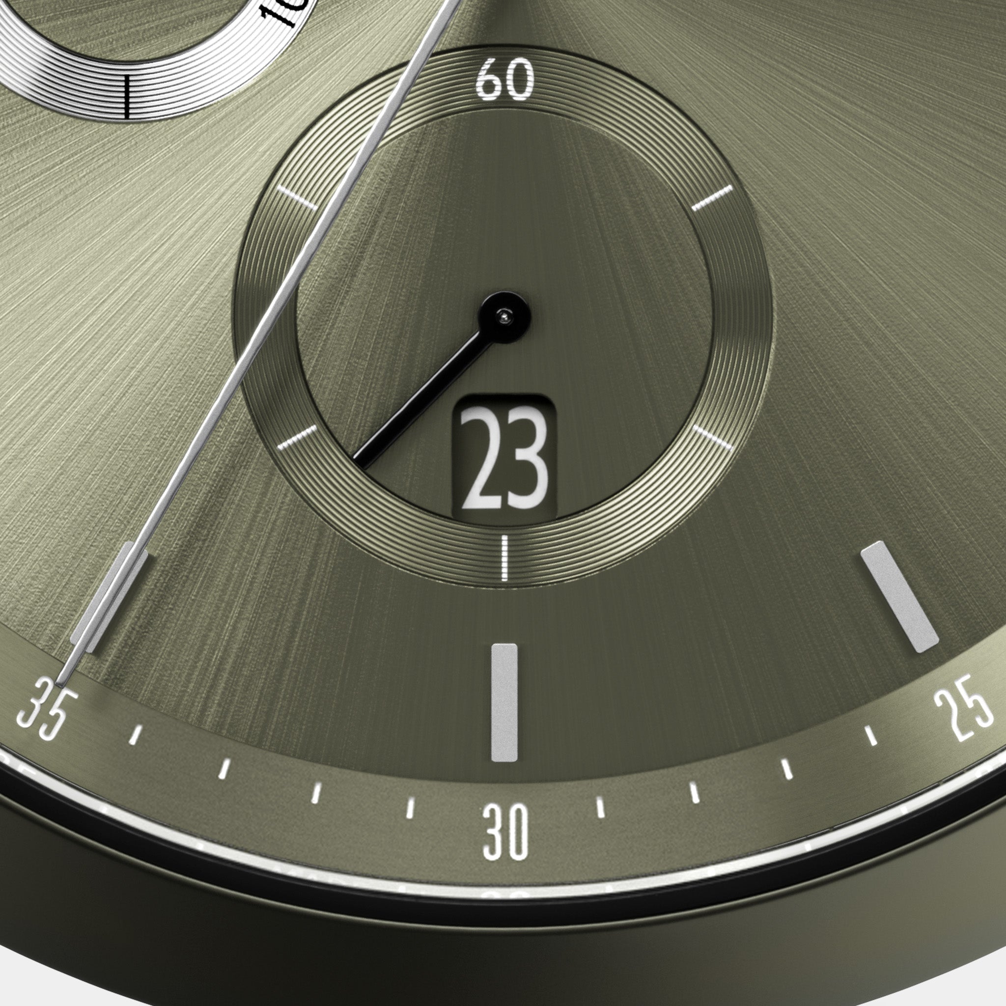 Close-up of an olive green watch dial with date display and silver hands