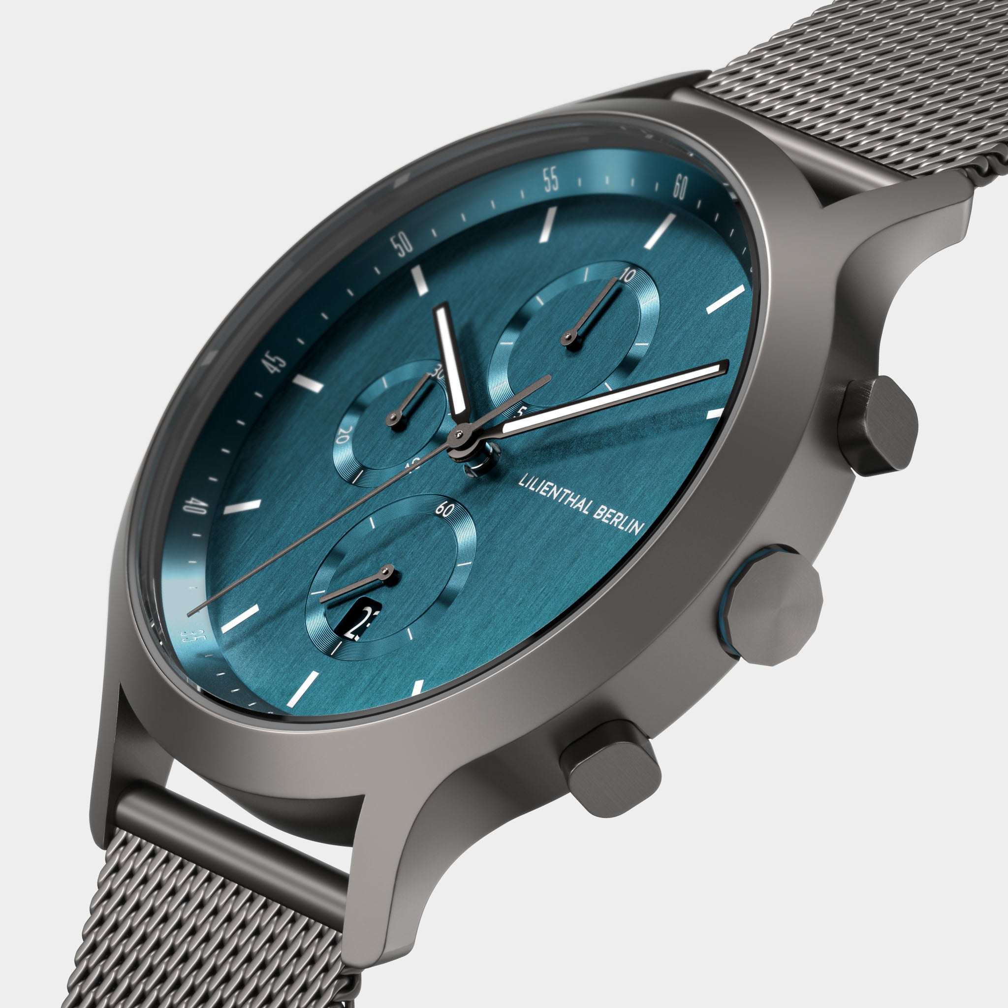 Men’s chronograph watch with blue dial, silver mesh strap, and three subdials