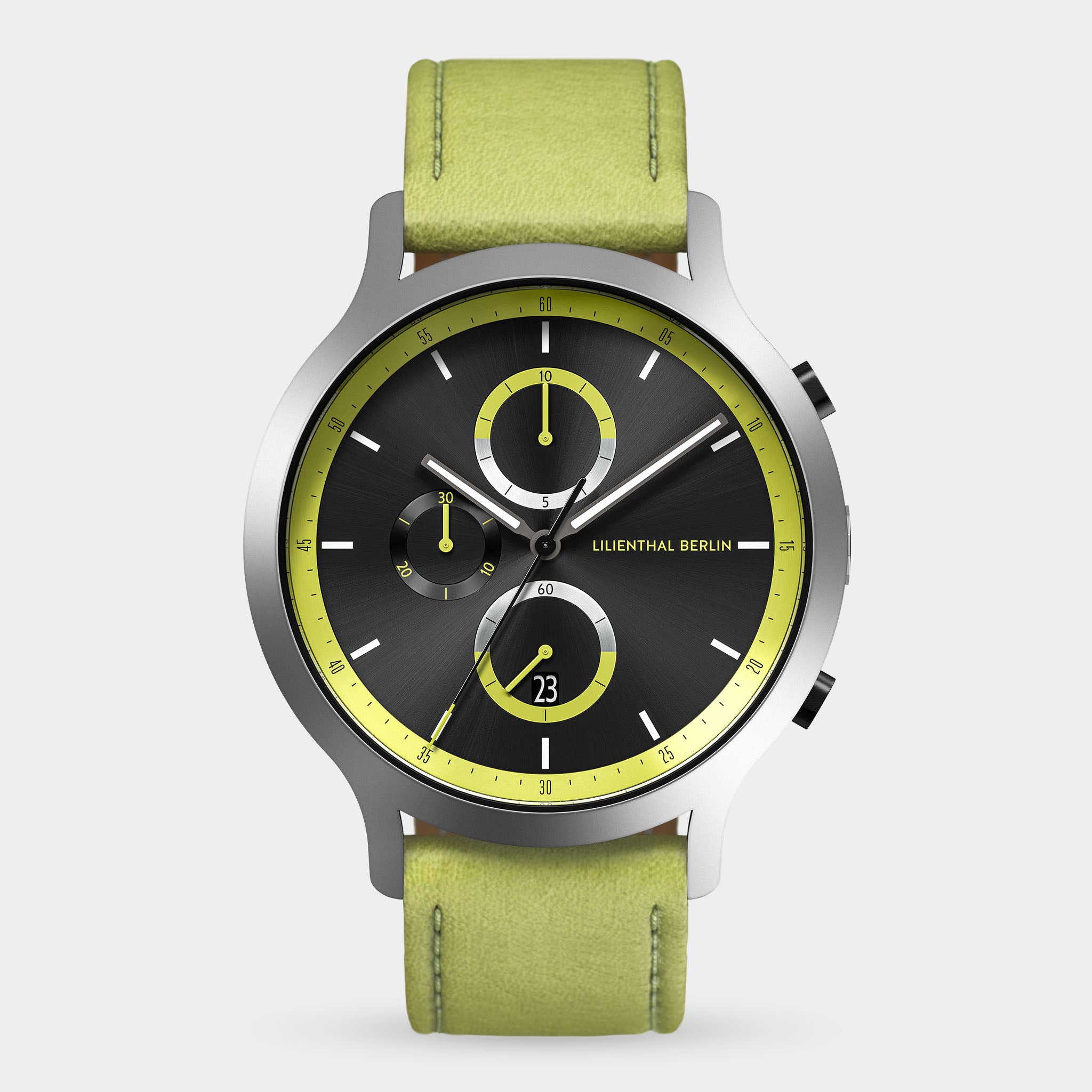 Modern chronograph watch with black dial, yellow accents, and light green leather strap