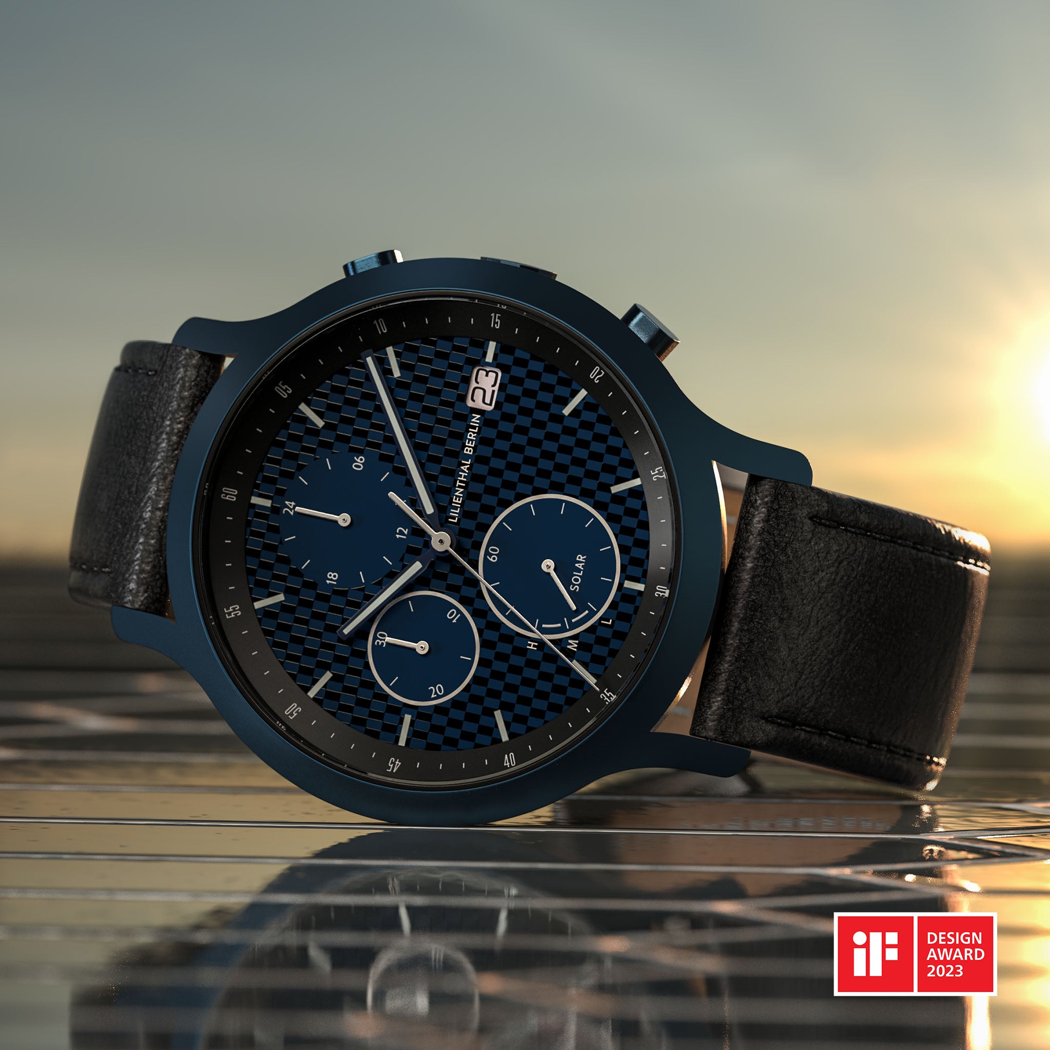 Elegant blue solar chronograph watch with black leather strap, sunset background, iF Design Award 2023